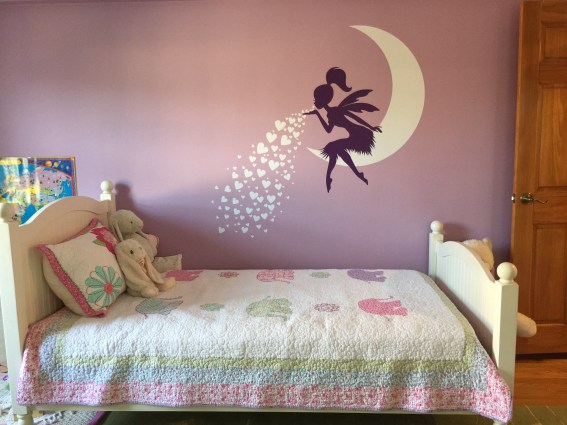 Fairy blowing hearts wall decal from Etsy