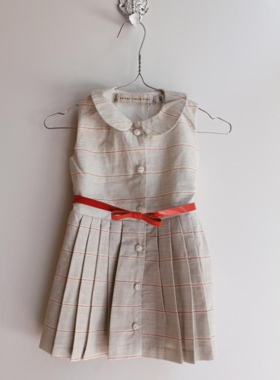 Girls classic dress on a hanger